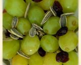 A picture of step 2 of Salad with peaches & green grapes.