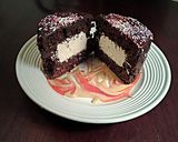 A picture of step 21 of Tiramisu Cream Filled Chocolate Cakes.