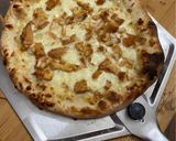 A picture of step 6 of Greek Chicken Pizza.
