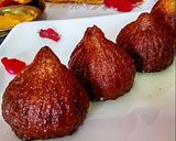A picture of step 12 of Chhenajhilli modak.