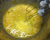 A picture of step 5 of Fluffy Madeleines with Orange Peels.