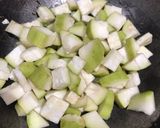 A picture of step 2 of Bottle gourd tomato curry.