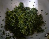 A picture of step 2 of Aloo palak.