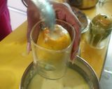 A picture of step 3 of Ice cream loaded mango.