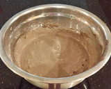 A picture of step 7 of Chocolate Layer Cake with Strawberry Cream Filling, White Chocolate Ganache Frosting coated with a Chocolate Crumble.