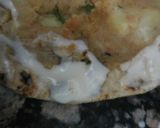 A picture of step 5 of Crunchi chapati stuff roll.