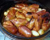 A picture of step 5 of Chicken Wings And Sausage In Whisky Sauce.