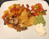 A picture of step 7 of Chilli nachos & salsa.