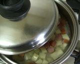 A picture of step 3 of Potato and Wiener Sausage Curry Soup.