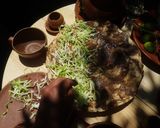 A picture of step 9 of Oaxacan Tlayudas.