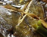 A picture of step 7 of Easy Simmered Flounder in a Frying Pan.