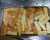 A picture of step 2 of French Toast Snacks with Bread Crusts.