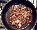 A picture of step 2 of Ottolenghis Roasted Eggplant, w/Feta, Onion & Chopped Lemon.