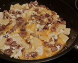 Foto del paso 5 de la receta: Revuelto de champiñones y queso🍄🧀