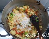 A picture of step 2 of Khopra Masala Aloo or Potatoes with Dry Coconut.