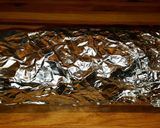 A picture of step 6 of Mike's Creamy Garlic Sun Dried Tomato Bagel Spread.