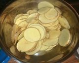 A picture of step 1 of Scalloped potatoes.