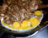 A picture of step 4 of Pad See Ew / Stir Fried Wide Rice Noodles with Chicken.
