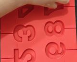 A picture of step 6 of Chocolate sprinkles numbers.