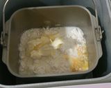 A picture of step 1 of Bread Maker Milk Butter Bread Rolls.