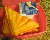 A picture of step 1 of Cheese scones on a electric sandwich maker.