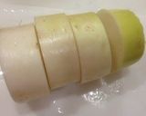 A picture of step 1 of Simmered Daikon & Atsuage Seasoned With Consomme.
