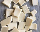 A picture of step 1 of White chocolate & nuts BLONDIES 👌😋.