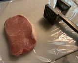 A picture of step 1 of Ton katsu (fried pork).