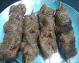 A picture of step 6 of Seekh kabab on gas stove.