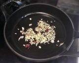 A picture of step 2 of Basil-Scented Aglio e Olio with Octopus and Olives.