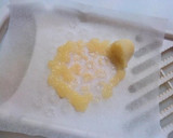 A picture of step 3 of Easy and Clean Way of Grating Ginger.