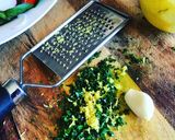 A picture of step 2 of Poached Eggs with Herb Filled Salad & Gremolata.