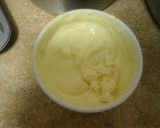 A picture of step 4 of No bake classic cheese cake with chocalate or christmas themed toppings.