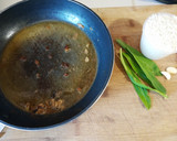 Foto del paso 1 de la receta: Arroz desglazado con cilantro cimarrón y ajo