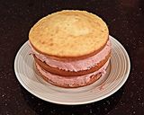 A picture of step 11 of Cherry Vanilla Layer Cake.