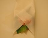 A picture of step 4 of Chicken Tender, Shiso and Mentaiko Spring Rolls.