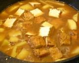 A picture of step 4 of Atsuage, Potato, & Ground Pork Simmered in Miso.
