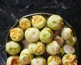 A picture of step 3 of Tinde(apple gaurd)with paneer stuffing.