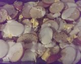 A picture of step 4 of Yummy scrummy garlicky potato bake.