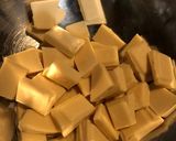 A picture of step 5 of Tart with Panna Cotta, White Chocolate Namelaka Cream, and Cocoa.