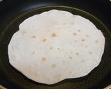 A picture of step 14 of Sandwich Wraps with Tortillas.