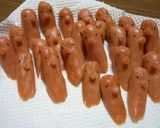 A picture of step 8 of Character Bento : 2 Octopus with 1 Sausage.