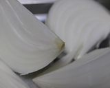 A picture of step 1 of Oven Baked Drumettes and Onions.