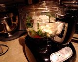 A picture of step 2 of Herbed green goddess dressing over lettuce wedges.