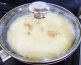 A picture of step 9 of Pancake Mix Cinnamon Apple Cake in a Frying Pan.