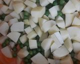 A picture of step 1 of Aloo matar.