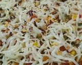 A picture of step 2 of Veg pizza.
