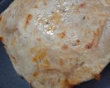 A picture of step 8 of Cheesy pizza sauce paratha.