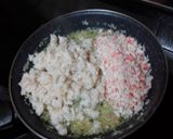 Foto del paso 3 de la receta: Pimientos del piquillo rellenos de merluza y palitos de cangrejo