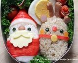 A picture of step 10 of Christmas Character Bento with Santa Claus and a Reindeer.